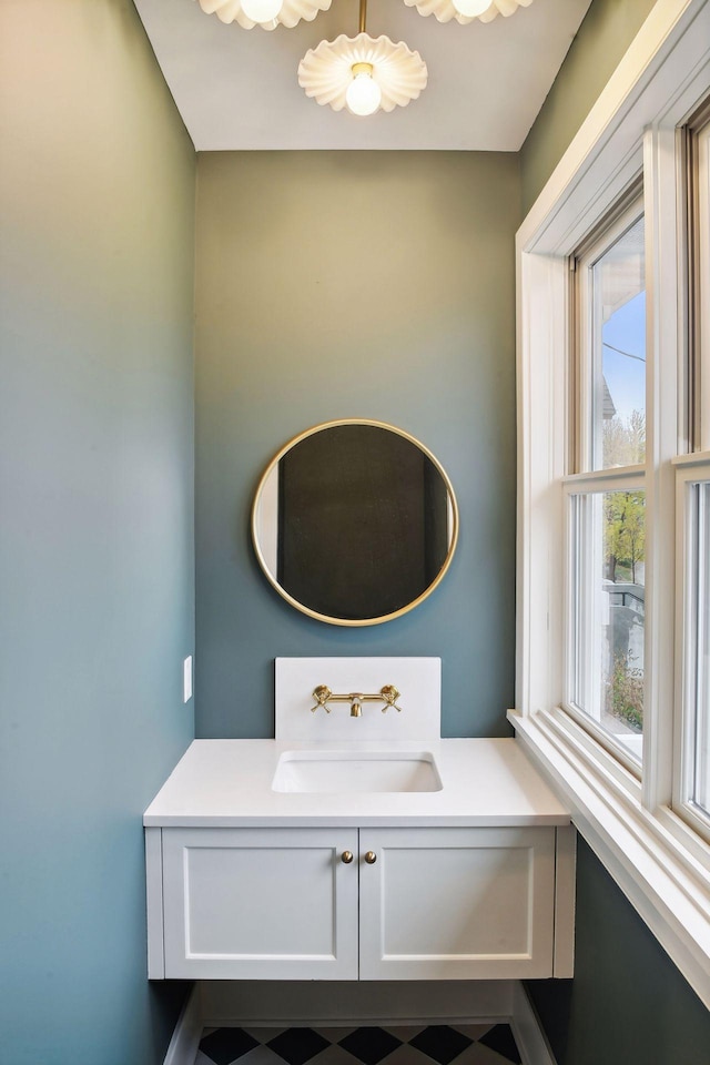 bathroom featuring vanity and plenty of natural light