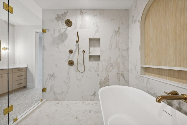 bathroom featuring vanity and separate shower and tub