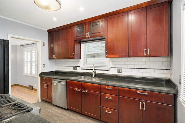 kitchen with sink, light hardwood / wood-style flooring, tasteful backsplash, ornamental molding, and stainless steel dishwasher