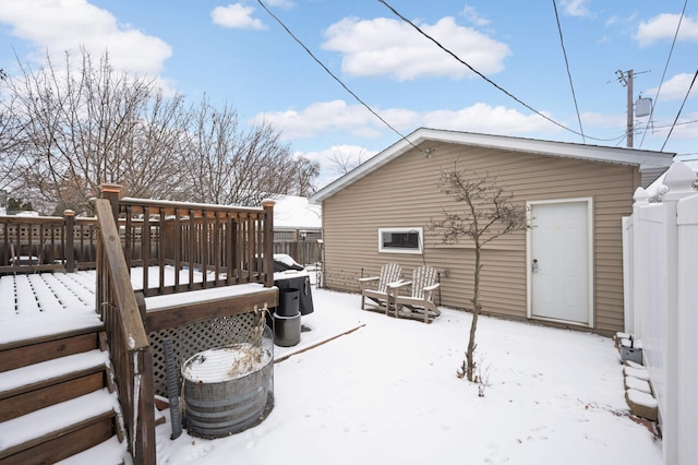 view of snow covered deck