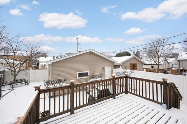 view of snow covered deck