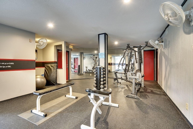 workout area with a textured ceiling