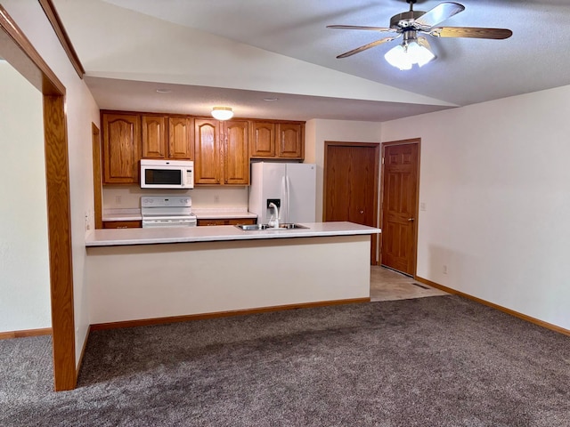 kitchen featuring lofted ceiling, light colored carpet, white appliances, and ceiling fan