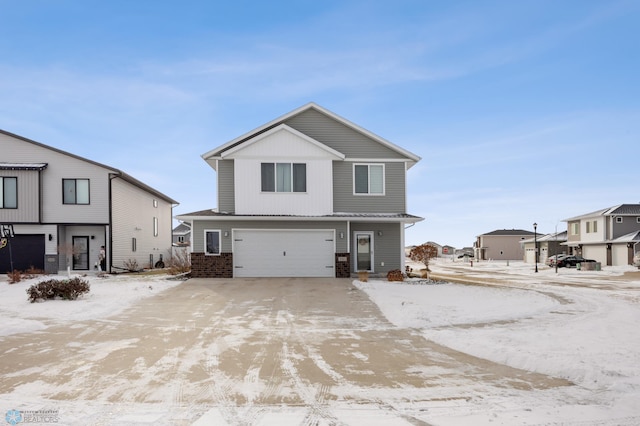 view of front of property with a garage