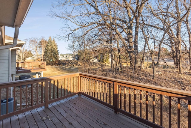 wooden deck featuring central air condition unit