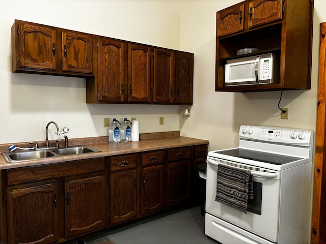 kitchen with sink and electric stove