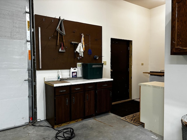 kitchen with dark brown cabinetry