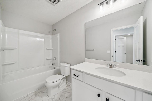 full bathroom featuring toilet, vanity, and tub / shower combination