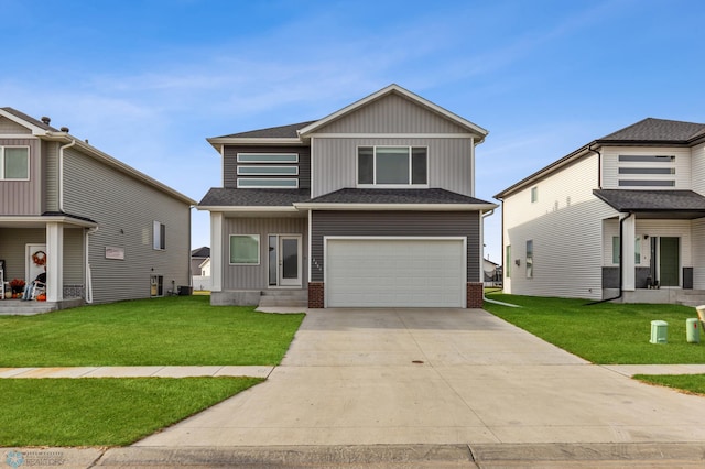 view of front property featuring a garage and a front yard