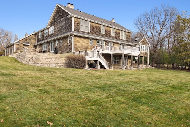 back of house with a yard, a chimney, central air condition unit, stairway, and a deck