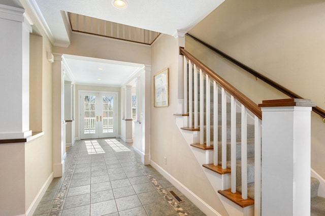 entrance foyer featuring recessed lighting, baseboards, stairs, french doors, and crown molding