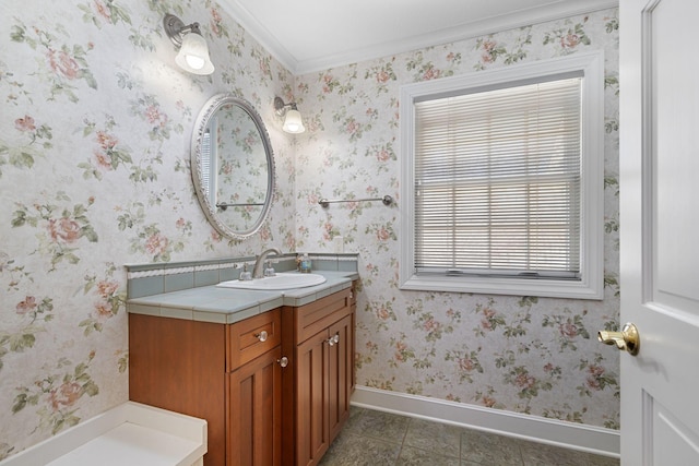 bathroom featuring wallpapered walls, tile patterned flooring, baseboards, and vanity