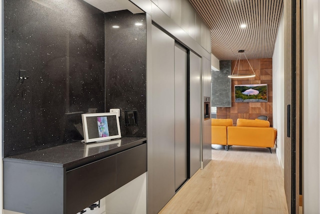 corridor featuring light hardwood / wood-style flooring