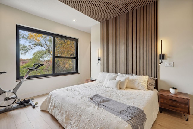 bedroom with light hardwood / wood-style flooring