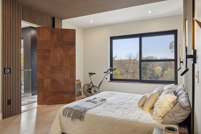 bedroom with light wood-type flooring