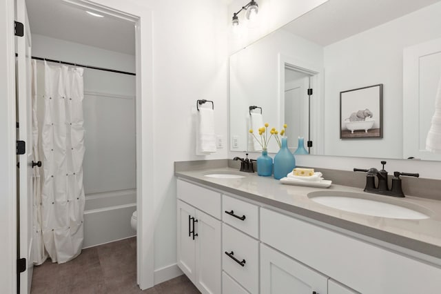 full bathroom featuring vanity, toilet, and shower / bath combination with curtain