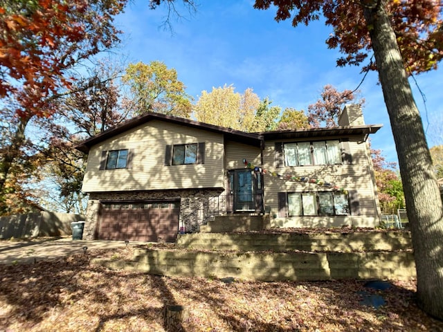 raised ranch with a garage