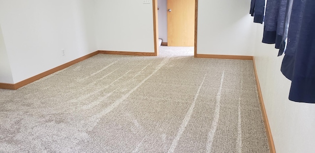 spare room featuring carpet flooring