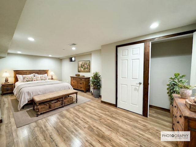 bedroom with light wood-type flooring