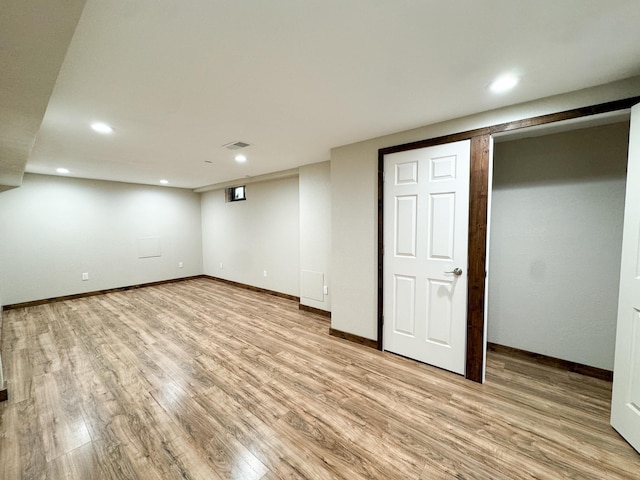 basement with light wood-type flooring