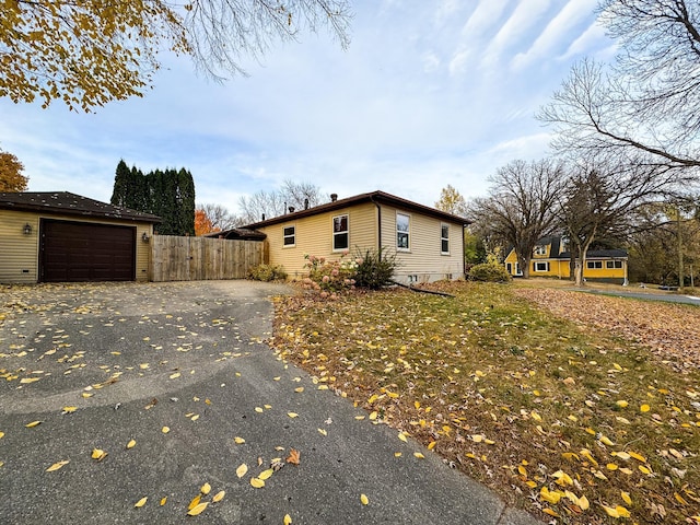 view of home's exterior featuring a garage