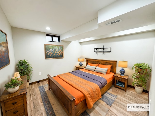 bedroom with light wood-type flooring