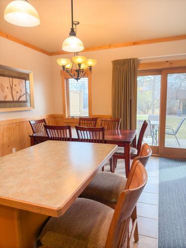 dining area featuring a notable chandelier and crown molding