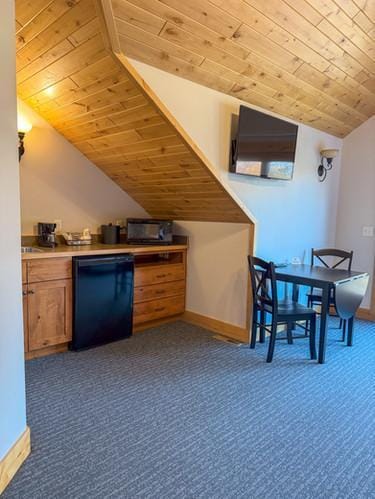 bonus room featuring dark colored carpet, vaulted ceiling, and wooden ceiling