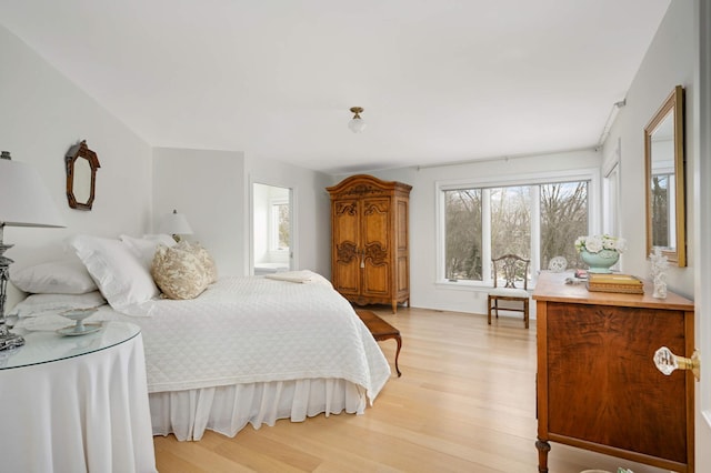 bedroom featuring light wood finished floors