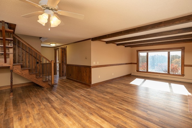 2700 115th St NW, Oronoco, MN 55960 - unfurnished living room with a ceiling fan, wood finished floors, baseboards, beamed ceiling, and stairs