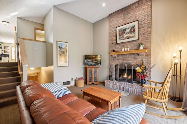 carpeted living room with a fireplace