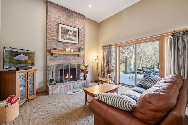 carpeted living room featuring a brick fireplace