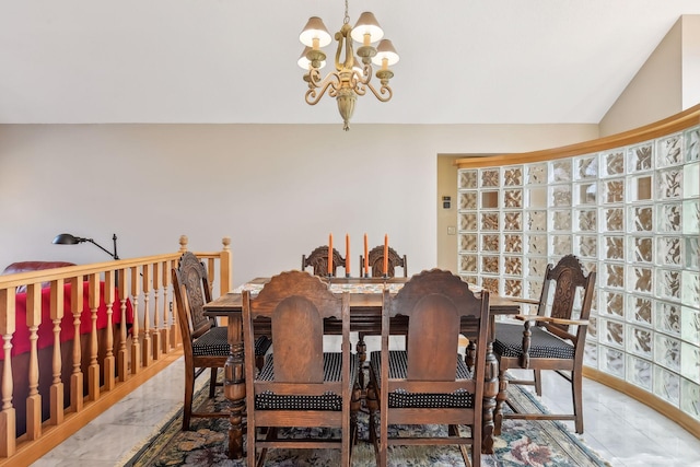 dining room with vaulted ceiling and a notable chandelier