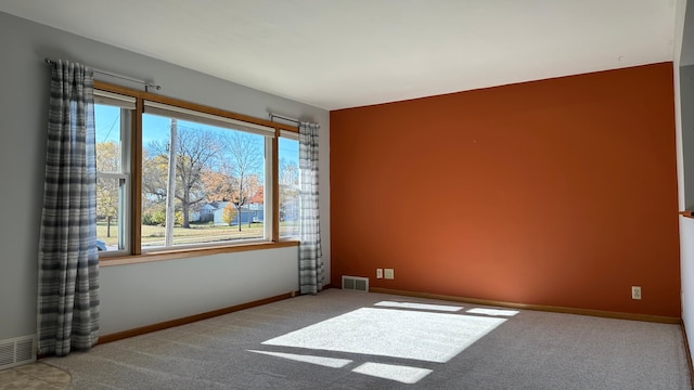 view of carpeted spare room