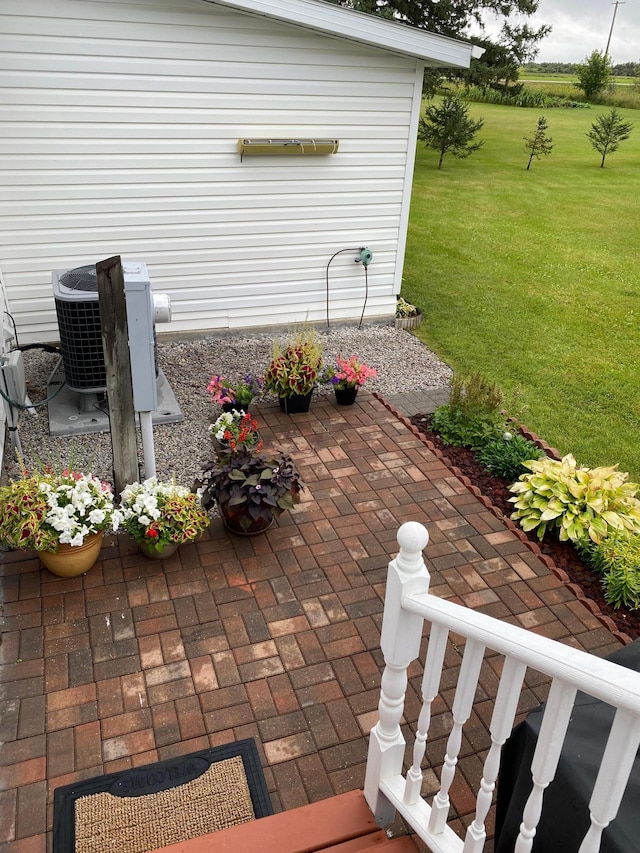 view of patio / terrace with central air condition unit