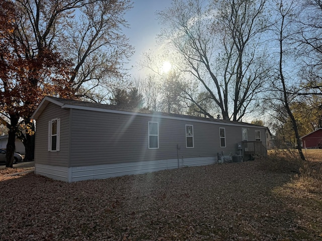 view of back house at dusk