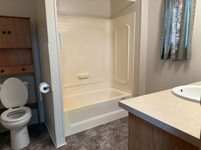 full bathroom with vanity, tub / shower combination, and toilet