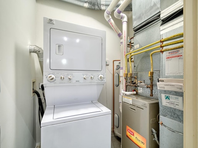 washroom with stacked washer / dryer