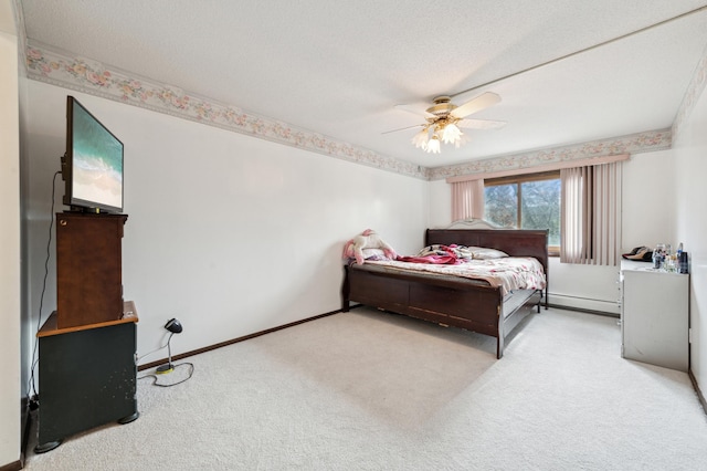 bedroom with ceiling fan, baseboard heating, and light colored carpet