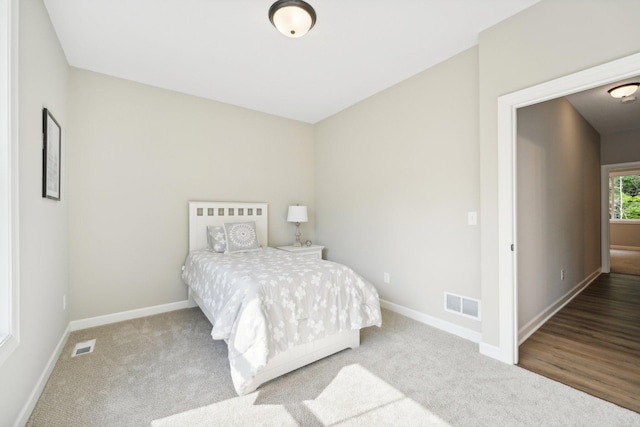 bedroom featuring hardwood / wood-style floors