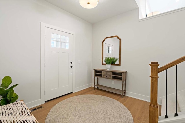 foyer with light wood-type flooring