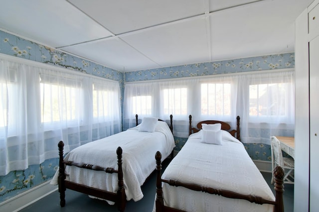 bedroom with wallpapered walls