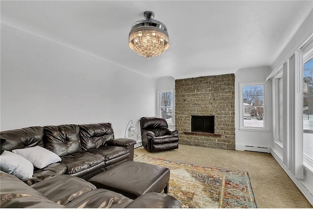 carpeted living room featuring baseboard heating and a fireplace