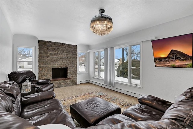 living room with a fireplace, a textured ceiling, light carpet, and a baseboard heating unit