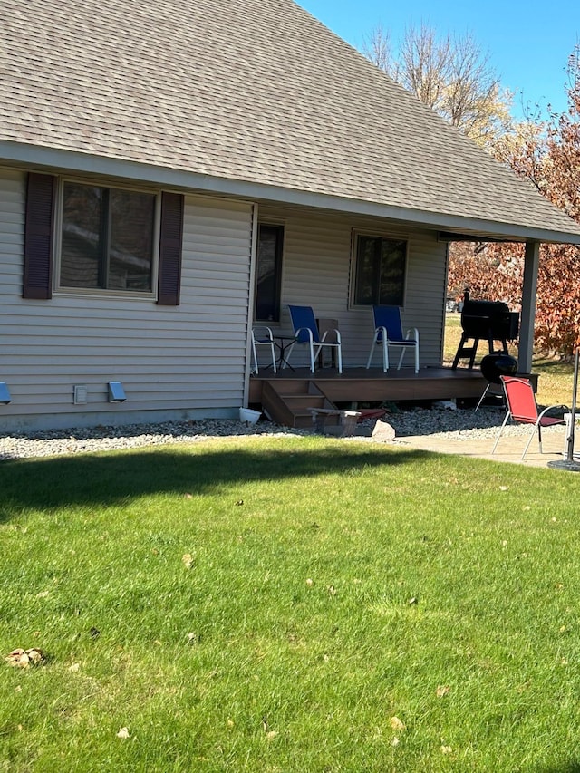 2501 Le Homme Dieu Vw NE, Alexandria, MN 56308 - back of property featuring roof with shingles and a yard