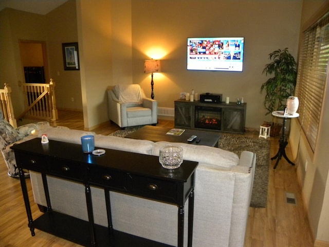 2501 Le Homme Dieu Vw NE, Alexandria, MN 56308 - living area featuring wood finished floors and baseboards