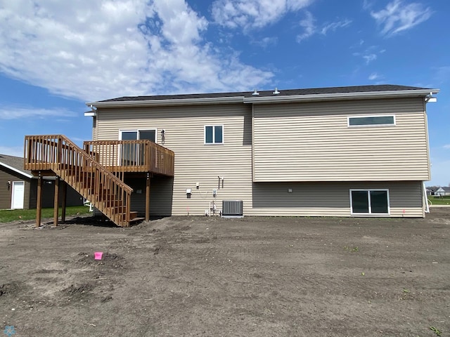 1312 Southview Dr SW, Glyndon, MN 56547 - rear view of property featuring central AC, a deck, and stairs
