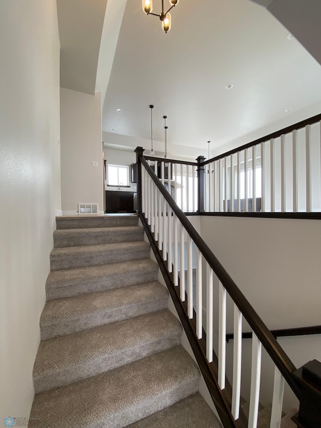 1312 Southview Dr SW, Glyndon, MN 56547 - stairs with a chandelier and recessed lighting