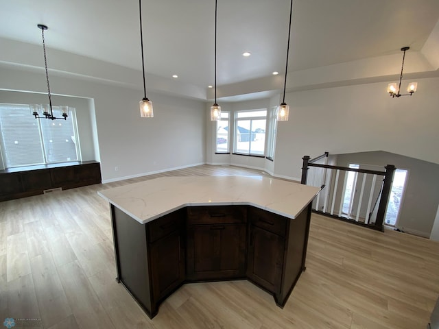 1312 Southview Dr SW, Glyndon, MN 56547 - kitchen with a chandelier, open floor plan, light wood-style flooring, and recessed lighting