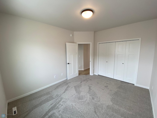 1312 Southview Dr SW, Glyndon, MN 56547 - unfurnished bedroom featuring carpet, baseboards, and a closet